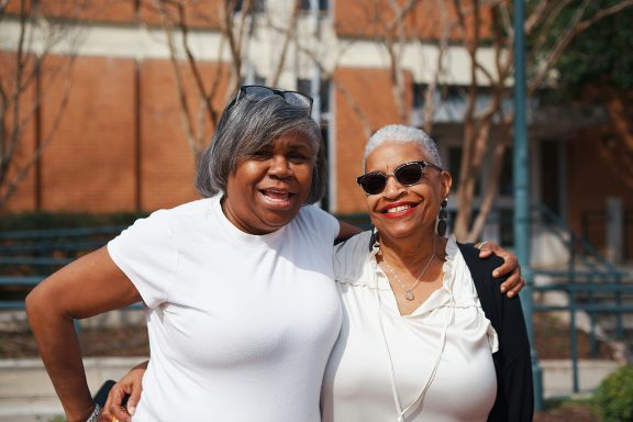 Two senior women smiling together